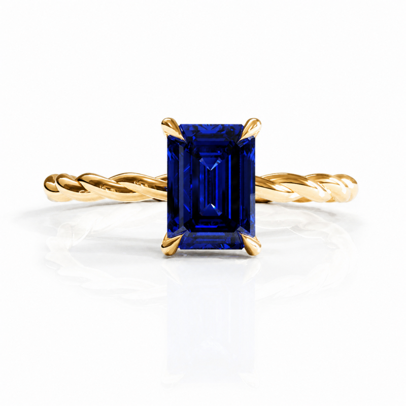 Emerald Cut Lab Grown Sapphire Hidden Halo Twisted Engagement Ring - Image 1