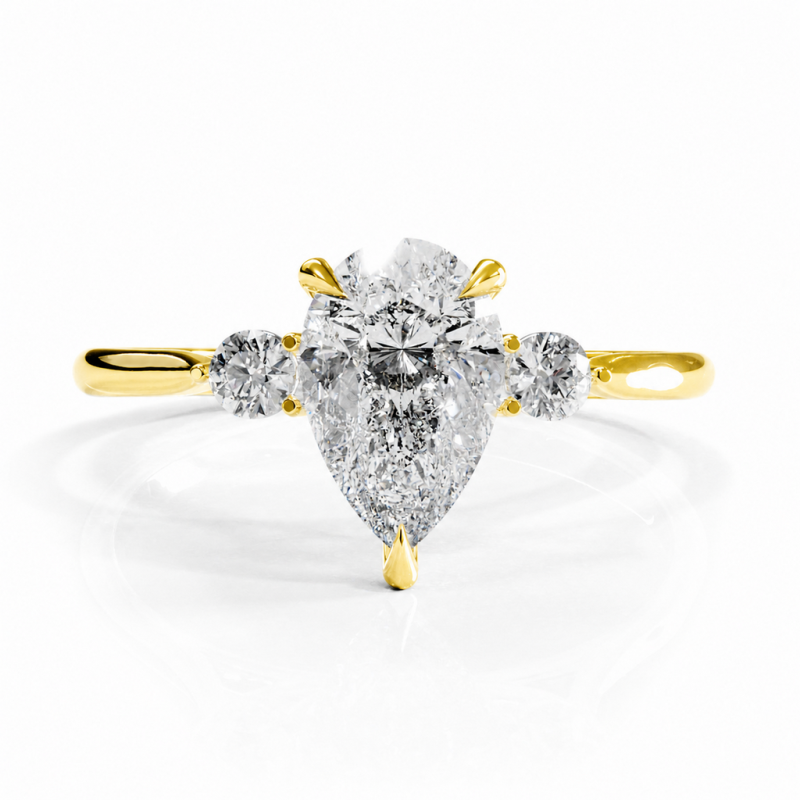 Pear Cut Moissanite Three Stone Engagement Ring - Image 1