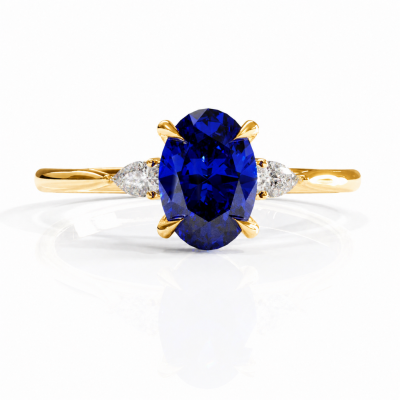 Oval Cut Lab Grown Sapphire Three Stone Engagement Ring
