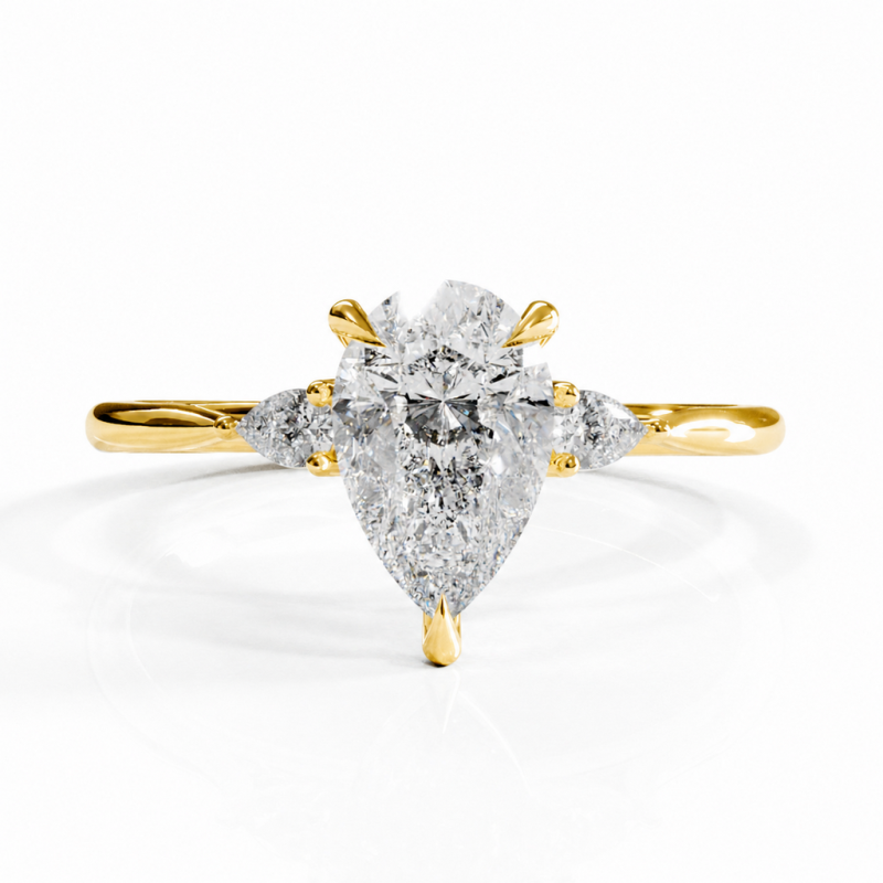 Pear Cut Moissanite Three Stone Engagement Ring - Image 1